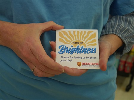 Redstone surprises residents with free gas and groceries