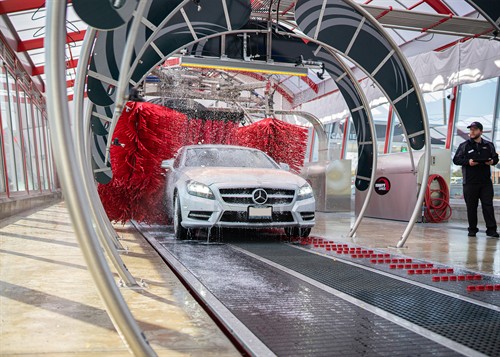 Full-service wash in action — our soft-touch brushes and expert team make sure every vehicle gets the royal treatment.