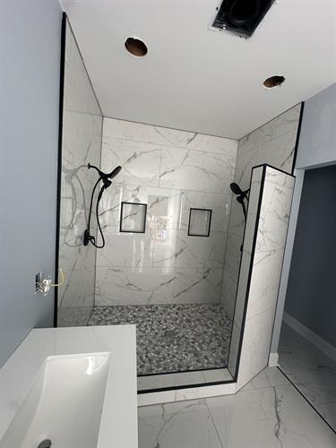 CUSTOM TILED HIS & HER SHOWER !!! Give us a call 