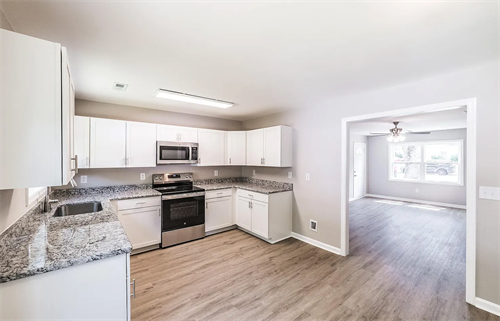 Renovated kitchen and interior of a Huntsville home by Huntsville House Buyer AL