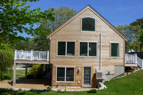 Addition with beautiful deck and lots of windows in Brewster. Addition with beautiful deck and lots of windows in Brewster.