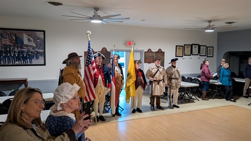 Flagpole dedication in main hall with SAR