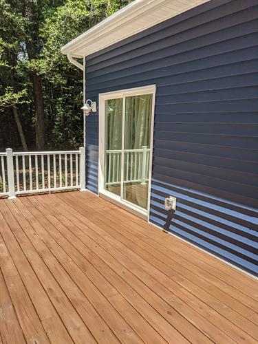 This customer had a brand new deck built on their property.  After a high investment into the deck they wanted to protect it and asked us to apply a semi transparent stain, This is the result.  Customer was extremely happy. 