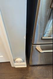 Refrigerator hitting corner of drywall