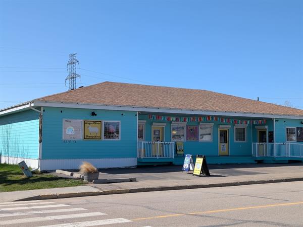 You cannot possibly miss our jolly store building!