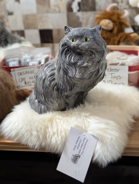 We have lots of sheepskin pet beds!