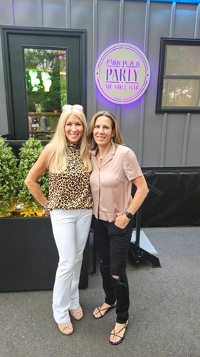 Maryann and Lila, co-founders, at an event