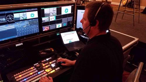 our Tricaster operator behind the console for the AAKP live stream.  