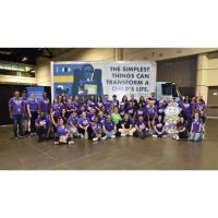 Universal Orlando Team Member Volunteers Help Fill Over 25,000 Backpacks with School Supplies for Students