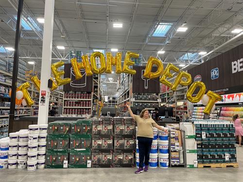 A helium arch spelling out The Home Depot for their regrand opening in Miami.