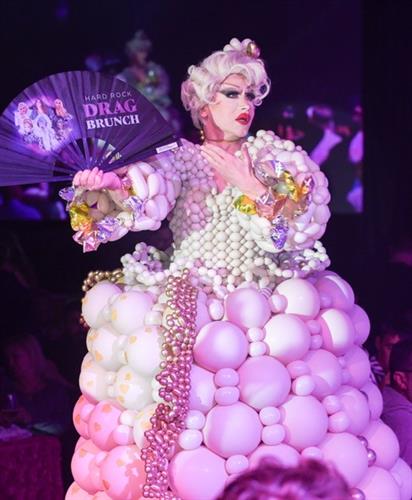 Drag Queen Daisy Deadpetals turns up the glam and glides down the runway in her stunning Madonna-inspired "Vogue" balloon dress, custom created by Lights Camera Selfies for the legendary Hard Rock Drag Show!