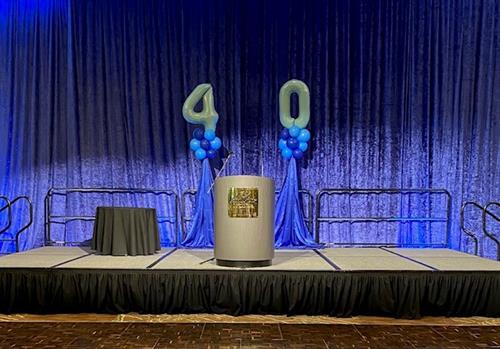 Award stage backdrop for a 40th Class Reunion at the Seminole Hard Rock Hollywood.