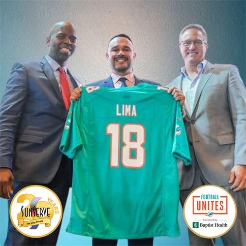 Tony Lima receives Miami Dolphin Jersey 