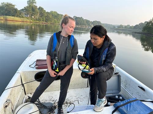 Collecting data at sunrise for the Unified Water Study - Monitoring the health of Long Island Sound