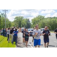 ConnectiCare employees cheer on Special Olympics Law Enforcement Torch Run participants