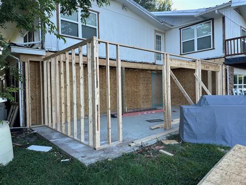 A room addition to a second story home being started