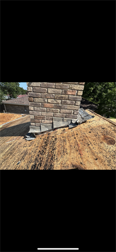 Chimney Flashing with the deck torn all the way off to reveal any issues and water damage.