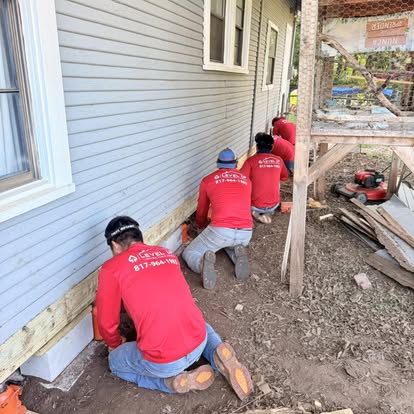 Crew Reapiring a Pier & Beam 