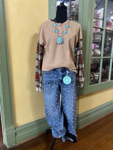 Fun fall top with pearl studded jeans.