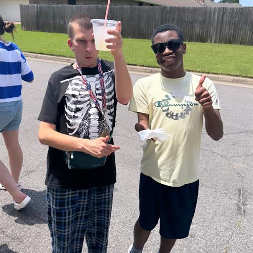 REACH Adult Participants stopping at a lemonade stand 