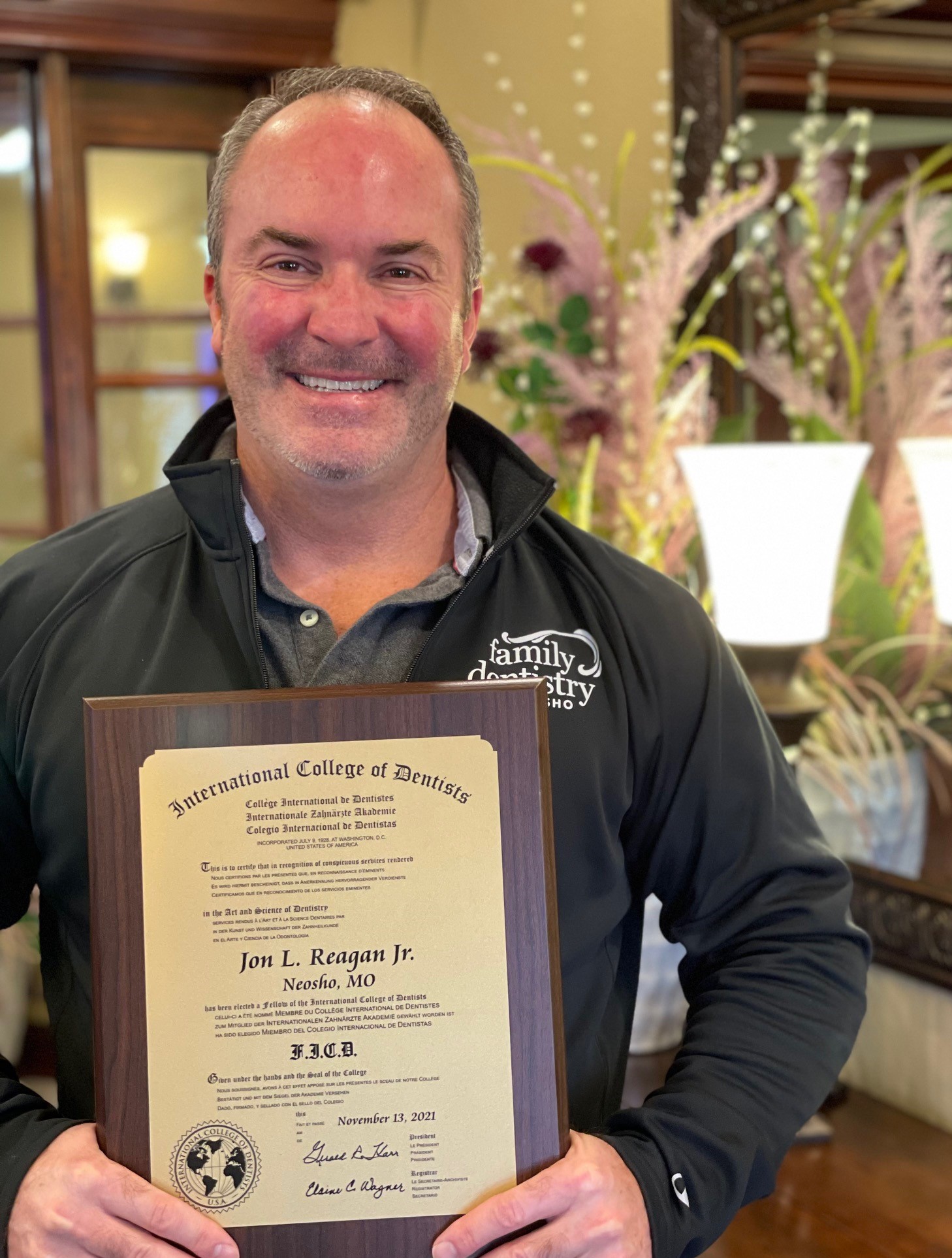 Image for The International College of Dentists USA Section presented a local practitioner, Dr. Jon Reagan with a membership plaque, a gold lapel pin and an engraved gold key symbolic of this Fellowship for conspicuous service rendered in the art and science of Dentistry.