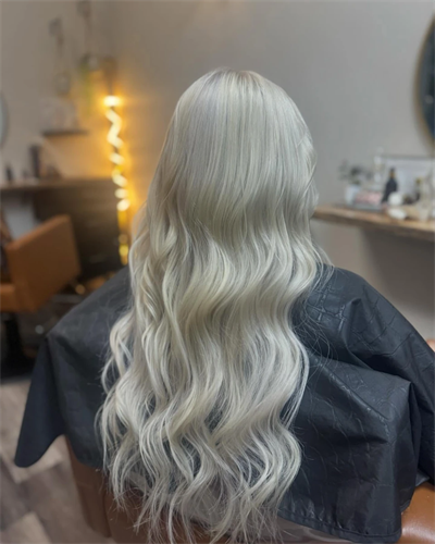 Platinum blonde waves at Good Vibes Salon