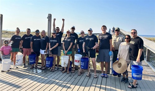 Canvas Cares employees participate in a beach clean up day