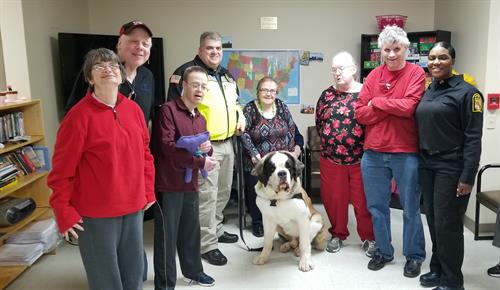 Clients enjoy a visit from Officer Doughnut! Clients enjoy a visit from Officer Doughnut!