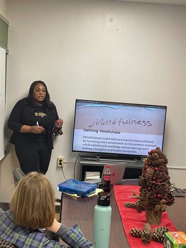 CEO and Founder Denise Williams leading a discussion about wellness