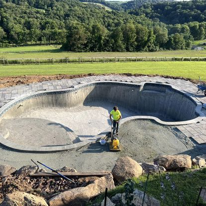 Paver installation on custom pool