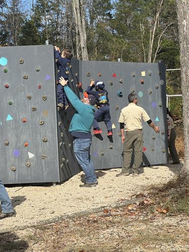 Building strength and confidence! Cub Scouts learn rock climbing techniques and challenge themselves at our Fall Fest event.