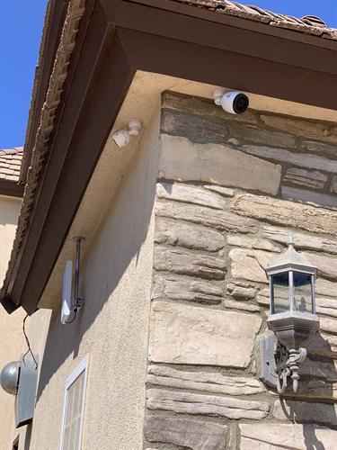 Hardwired PoE cameras and Wifi Access Points provide services throughout a 5 Acre property