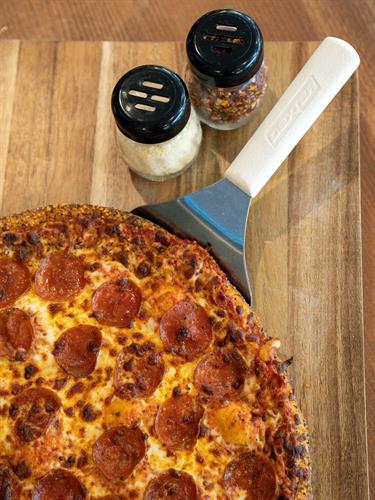 Pepperoni Pizza — Made Fresh in Our Pizza Oven at LedgeStone Grille  Baked to perfection in our pizza oven, this classic pepperoni pizza features a golden, crispy crust, rich house sauce, and melted cheese finished just right. Join us at LedgeStone Grille for fresh, made-to-order pizzas served in a welcoming, open-to-the-public setting near Table Rock Lake.