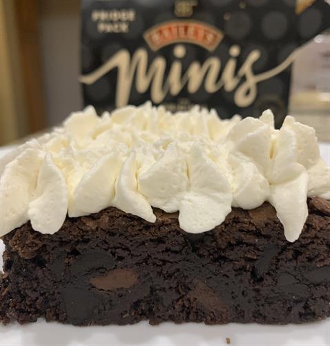 Espresso Brownies topped with Housemade Bailey’s Whipped Cream