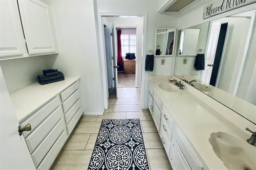 A jack and jill bathroom in one of our units