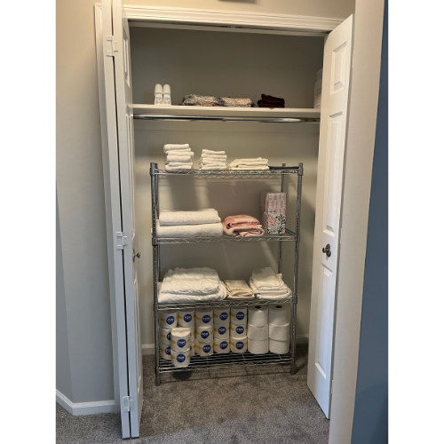 Linen closet - added freestanding shelf