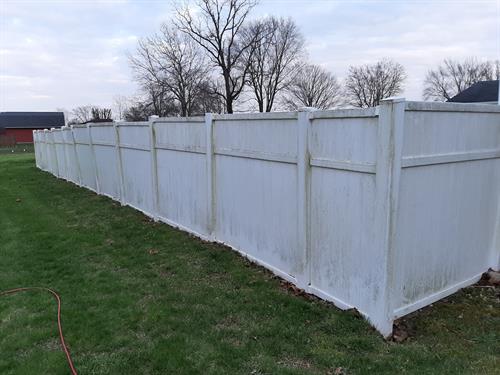 Before of a fence we power washed.