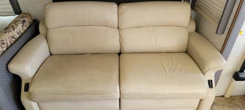 We clean upholstery of all varieteies!  Here is a camper leather loveseat. The left side is before we cleaned it and the right is after we had cleaned it.