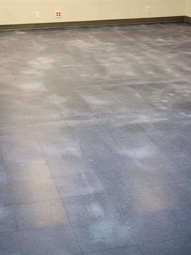 We strip and wax VCT floors.  This is an image after we had stripped off the old wax coatings and cleaned it.