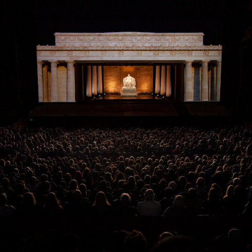 Audiences watch in the Pageant of the Masters' outdoor amphitheater as works of art come to life right before their eyes, including this re-creation of the Lincoln Monument. Credit: Rick Graves/Festival of Arts