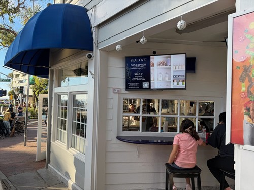 Your ad, on a screen at Adonis (facing Main Beach) 