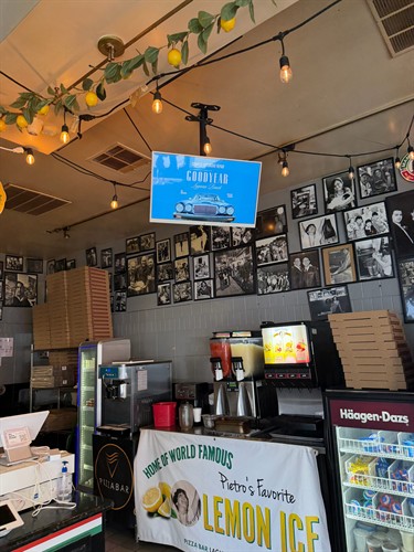 Your ad, on a screen in Pizza Bar