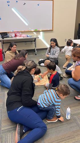 Our Family Coach, Yolanda, working with a group of families at the Basalt Regional Library.