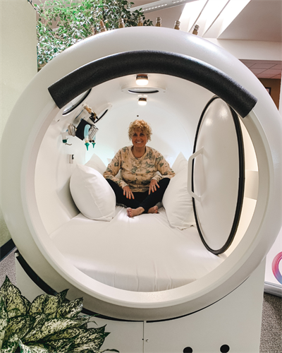 Co-Owner Edna Ness in a a hyperbaric oxygen chamber