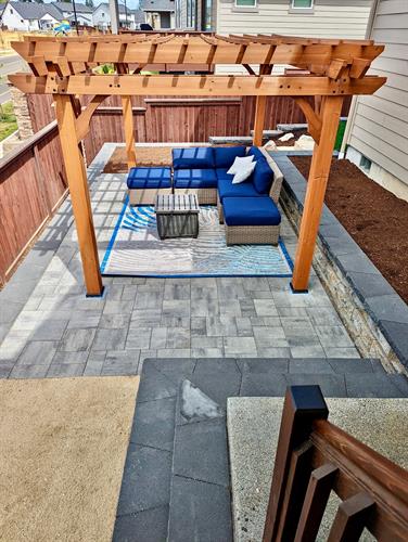 Patio and arbor by Greenhaven Landscapes