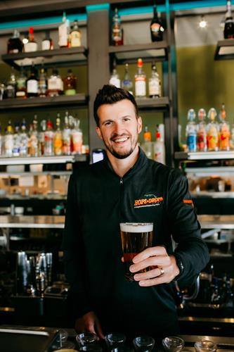 CEO Kevin Eggen serving an ice cold beer at 34'