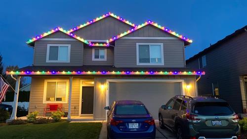 Custom Christmas light installation in Battleground, WA – brightening up the holiday season with a colorful, professional design.