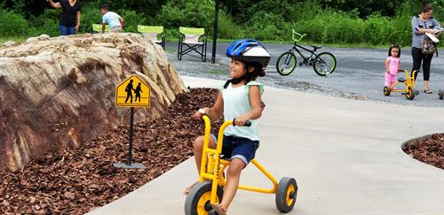 Outdoor Learning Environments promote exploration, socialization, and active play.