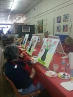 Adults having fun painting!