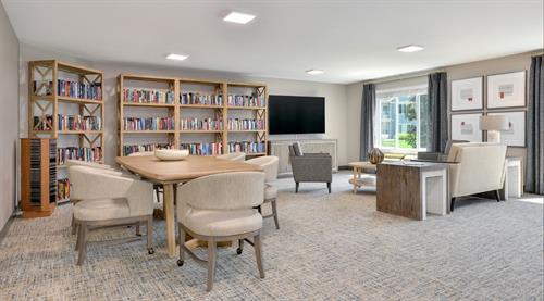 Borrow A Book, Join Book Club or Watch A Movie With Friends In Our Library & TV Room